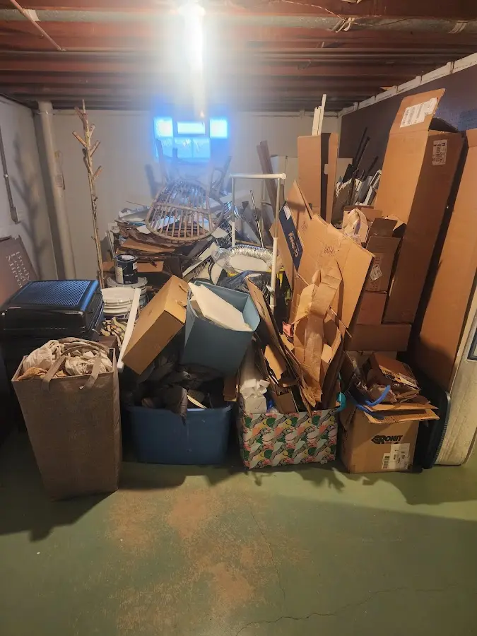 Roll-off dumpster container at job site for Yard Waste Dumpster Rental in Tea